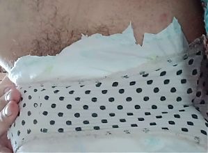 Huge pad in white panties.